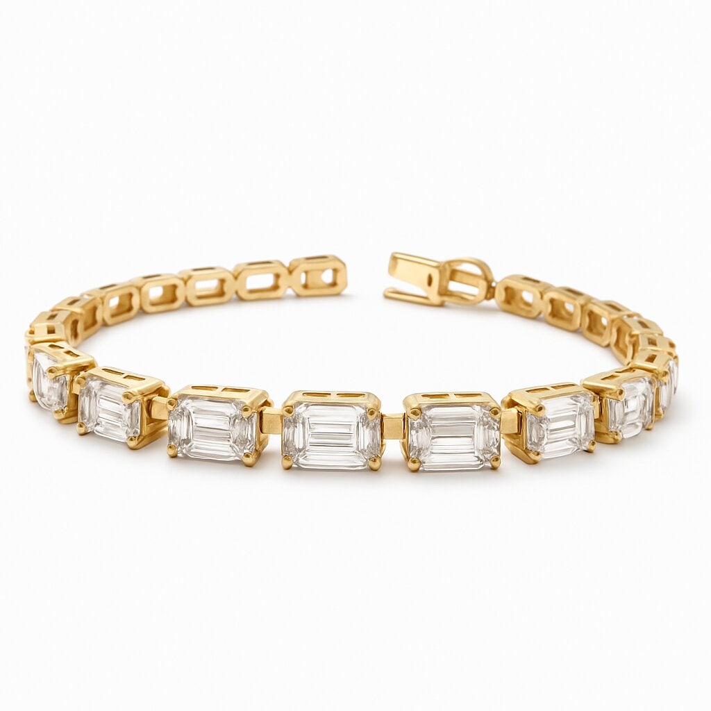 Lab Grown Emerald Cut Bezel Tennis Bracelet 9.08 Carats E-F VVS2-VS1: Lab Grown diamond tennis bracelet featuring 22 Emerald Cut Diamonds weighing 9.08 Carats, in a bezel prong setting, 14 Karat Yellow Gold. Average Diamond 0.41 Points. Color E-F Clarity VVS2-VS1