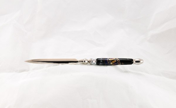 Fran Wincek: Fran Wincek letter opener, with a slender glass handle. Signature cane. Length 7 1/8". Colors vary.