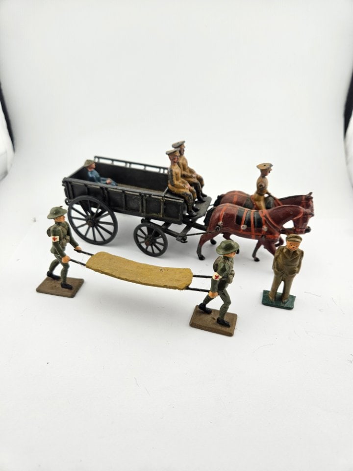 Britain's Set 1450 Royal Army Service Corps General Service (GS) Wagon, w/ Medics Carrying a: Britain's Set 1450 Royal Army Service Corps General Service (GS) Wagon, w/ Medics Carrying a Stretcher. Die Cast Lead Figures. Features a Horse Drawn Ambulance, and 2 Drivers w/ Whips.