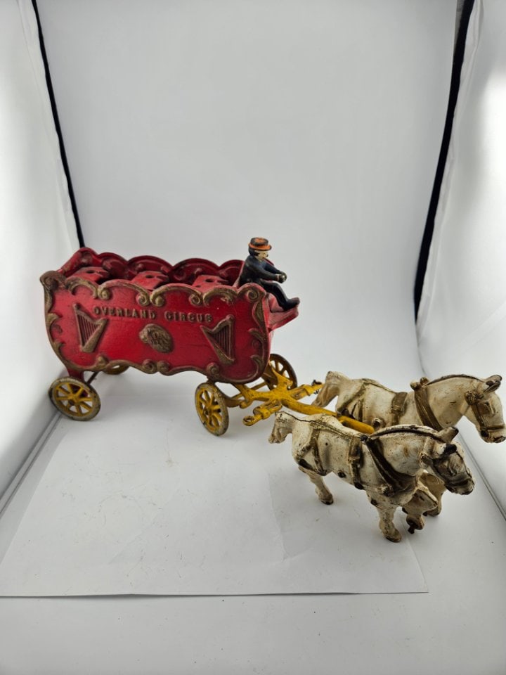 Overland Circus Cast Iron Horse and Wagon, by Kenton.: Overland Circus Cast Iron Horse and Wagon, by Kenton. Circa 1920's. The Wagon has Irish Harps. The Wagon Has All It's Wheels, but Horses are Missing Front Wheels and Driving Harness. Marked 314 and 33
