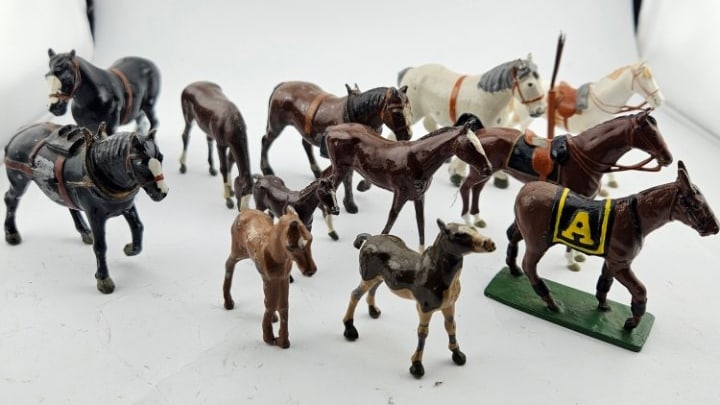 Herd of Cast Iron Painted Horses.: Herd of Cast Iron Painted Horses. Various Makers. A Dozen in Total. Some are Bare-Back, and There are a Wide Variety of Saddles and Colors.