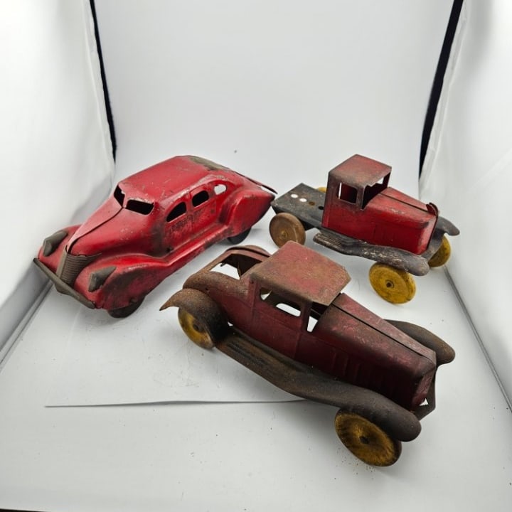 Three Old Stamped Metal Toy Vehicles w/ Wood Wheels. (1 of 7)