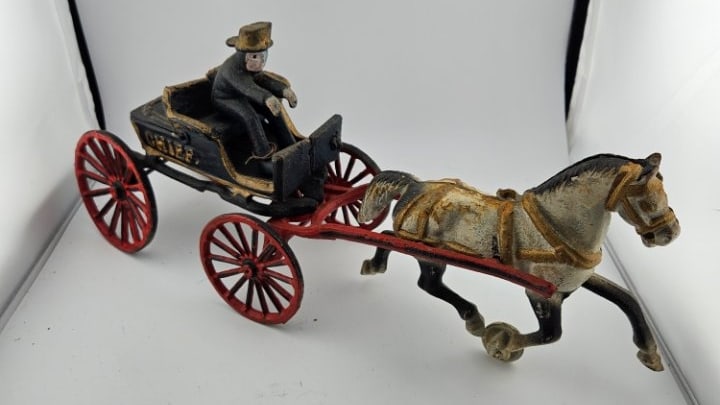 Vintage Cast Iron Horse Drawn Police Wagon.: Vintage Cast Iron Horse Drawn Police Wagon. The Cart is Marked PD and Has Wheels, the Horse Does Not.