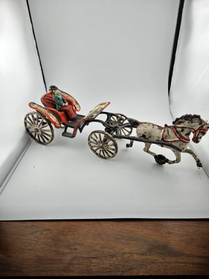 Pratt & Letchworth Cast Iron Horsedrawn Open Phaeton.: Pratt & Letchworth Cast Iron Horsedrawn Open Phaeton. The Horse has its Wheel. The Carriage has Its Wheel and a Female Driver. Missing Some Paint.
