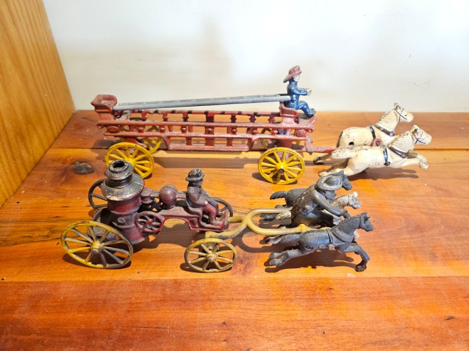 Antique Cast-Iron Horsedrawn Pumper and Ladder Trucks. (1 of 5)