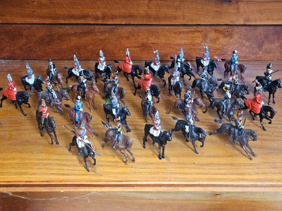 Lot of 30 Antique Handpainted Metal Mounted Horseman.: Lot of 30 Antique Handpainted Metal Mounted Horseman. There are a Couple of Red, Black, Brown, and Gray Coats. Some Carry Swords, Some w/ Flags. All in Good Shape.
