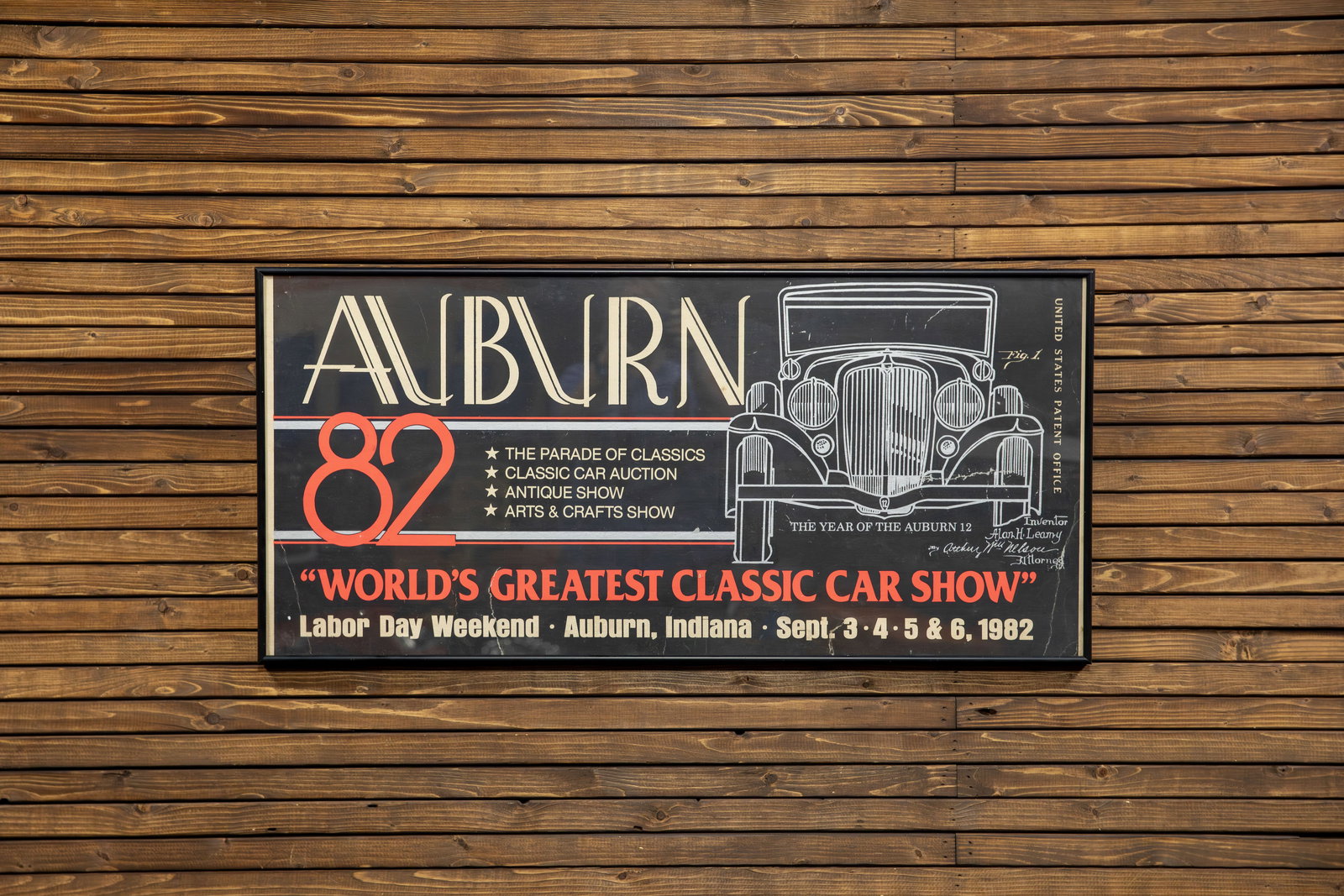 1982 ACD Festival Poster - Framed: Celebrating the Auburn 12, original official event poster, professionally framed, presents front view of 1932 year model with graphics from actual patent drawings by Alan Leamy. 
