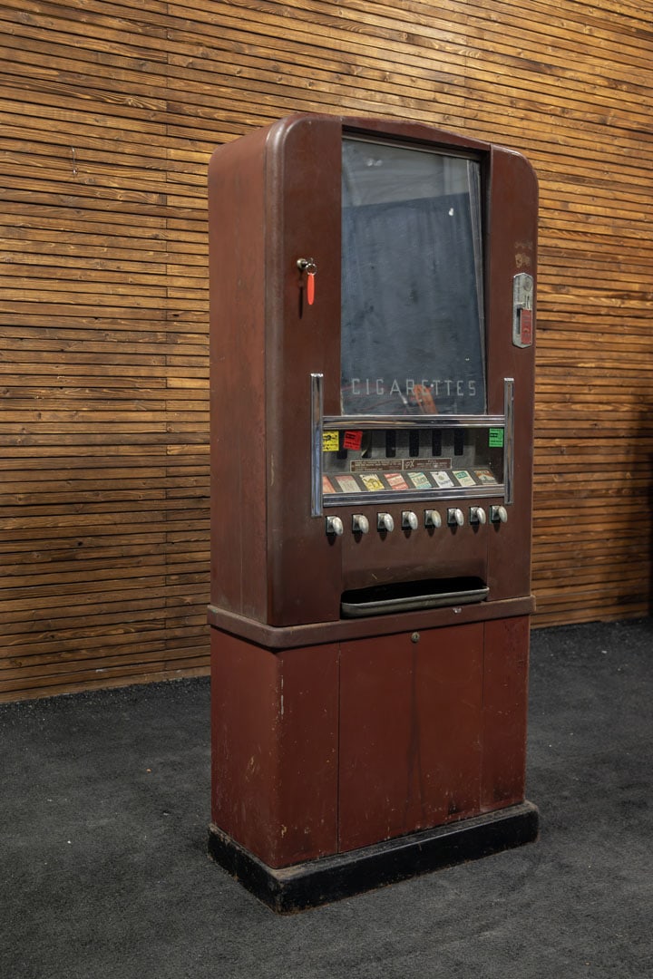 Lehigh PX Cigarette Machine - Unrestored: Circa late 1940s, this coin-operated dispenser offers eight different selections which are shown in a lighted window, needs full cosmetic and electrical restoration, 10V. 