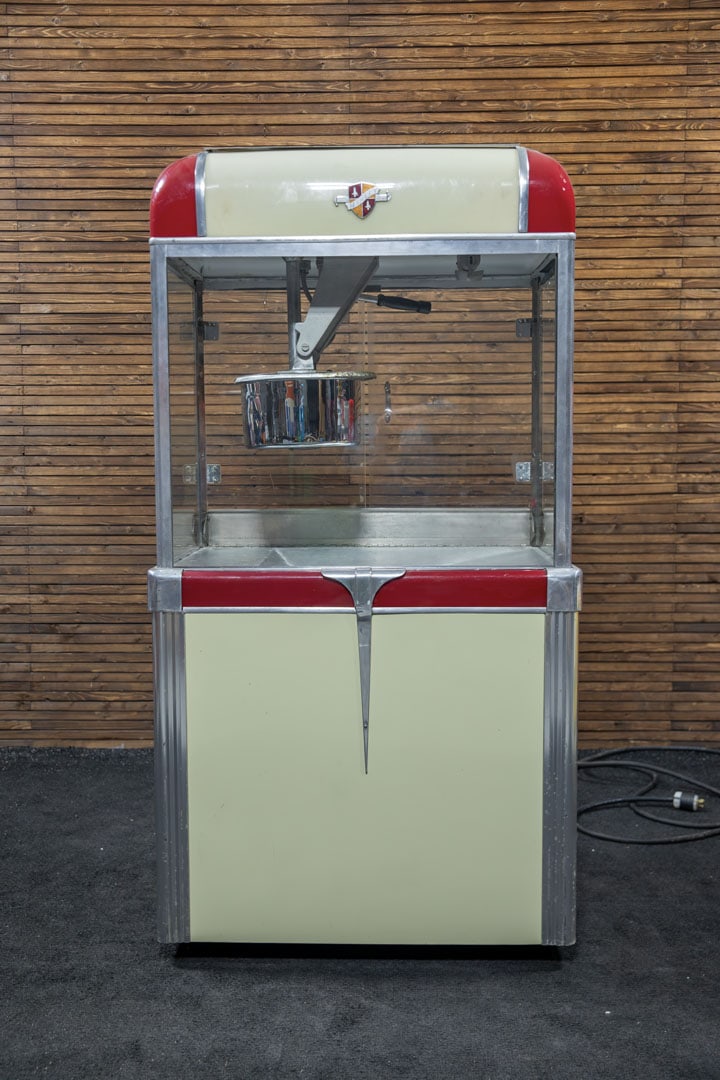 Manley M47 Theatre Popcorn Machine: Late 1940s vintage machine marketed as a "Popping Gold Mine", this floor model appears to be in working condition, not tested, has the "Old Maid" drawer, popcorn storage and other accessories, fitted