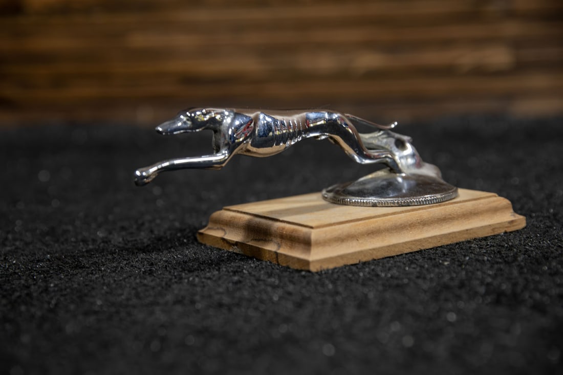 1934 Lincoln Greyhound Radiator Mascot: Original chrome plated Greyhound at full sprint with original radiator cap, very minor pitting.