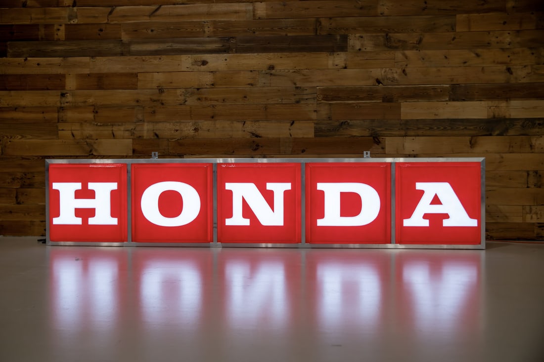 Large Honda Motorcycles Lighted Dealership Sign: Very large sign features 1980s-era new old stock individual letters that have been mounted in a custom-built aluminum canister with flush mounted mounting brackets, new LED lighting, commercial grade