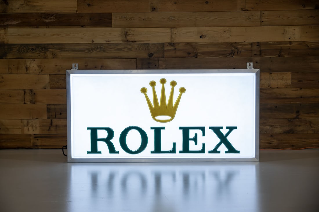 Vintage Rolex Watches Lighted Sign: Original acrylic face presents world famous logo, mounted to custom-built extruded aluminum body fitted with flush mounting brackets, new LED lights, commercial grade wiring, transformer and toggle