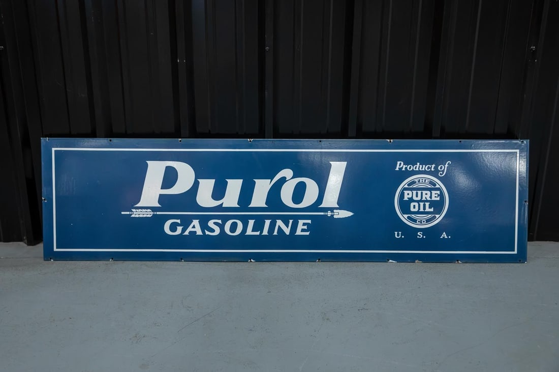 Rare Purol Gasoline Single-Sided Porcelain Sign: White lettering and graphics on dark blue field, SSP with excellent color and gloss, shows only minor wear around the mounting holes. Rated 9.25