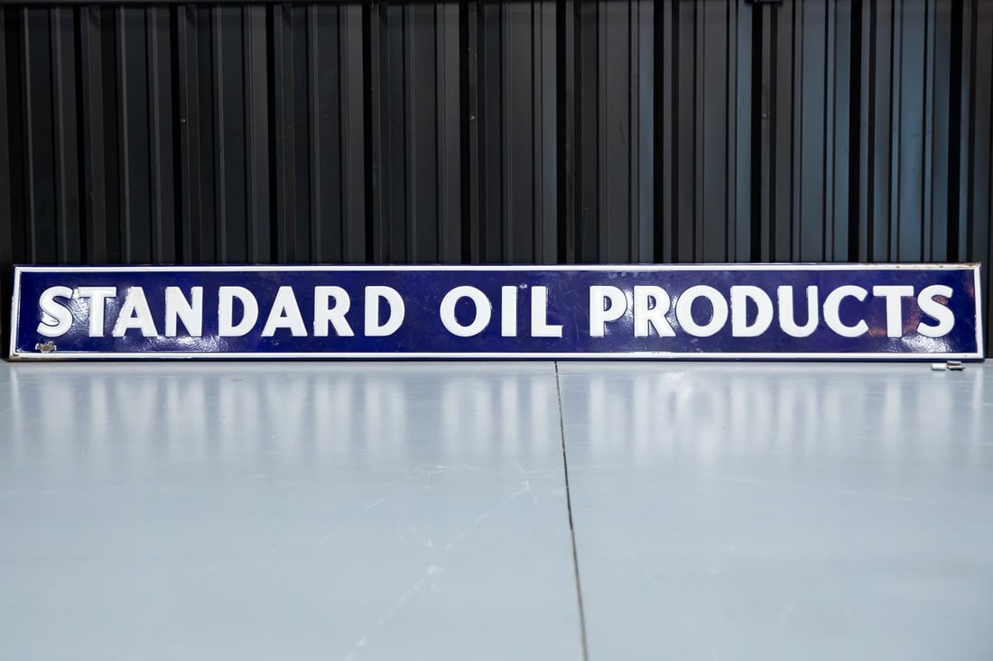 Standard Oil Products Embossed Single-Sided Porcelain Sign: Large SSP with excellent color and gloss, self-framed, presents raised border and lettering in white on dark blue field. Shows minor edge wear and one small chip in the field. Rated 8.75