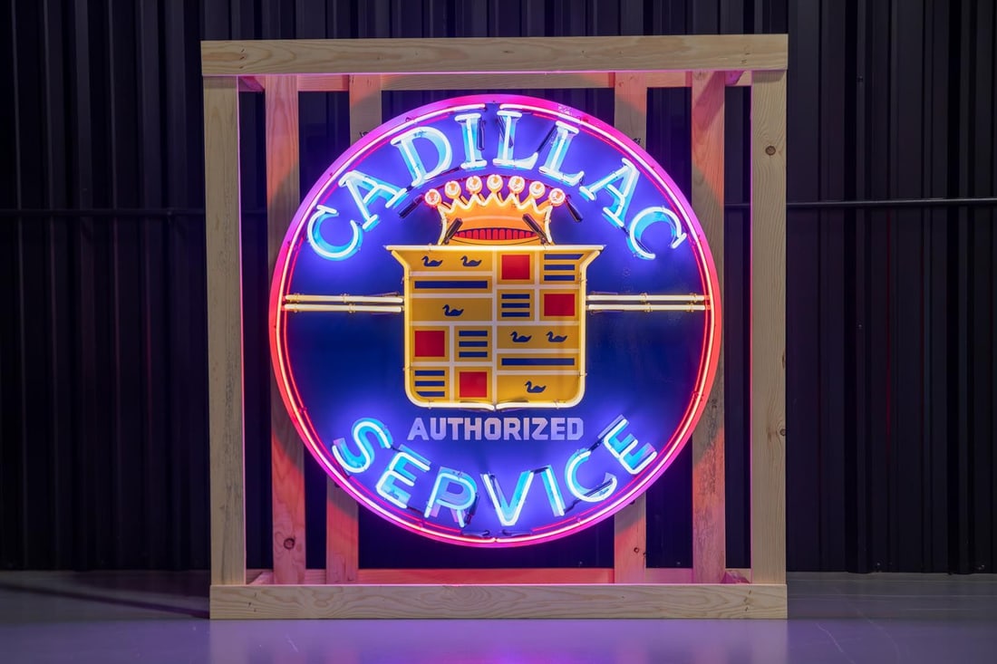 Custom Cadillac Authorized Service Large Neon Sign: Cadillac has always meant the finest in quality and this custom created sign was built in the same tradition with graphics on a composite base and illuminated in three colors of brilliant neon, crest