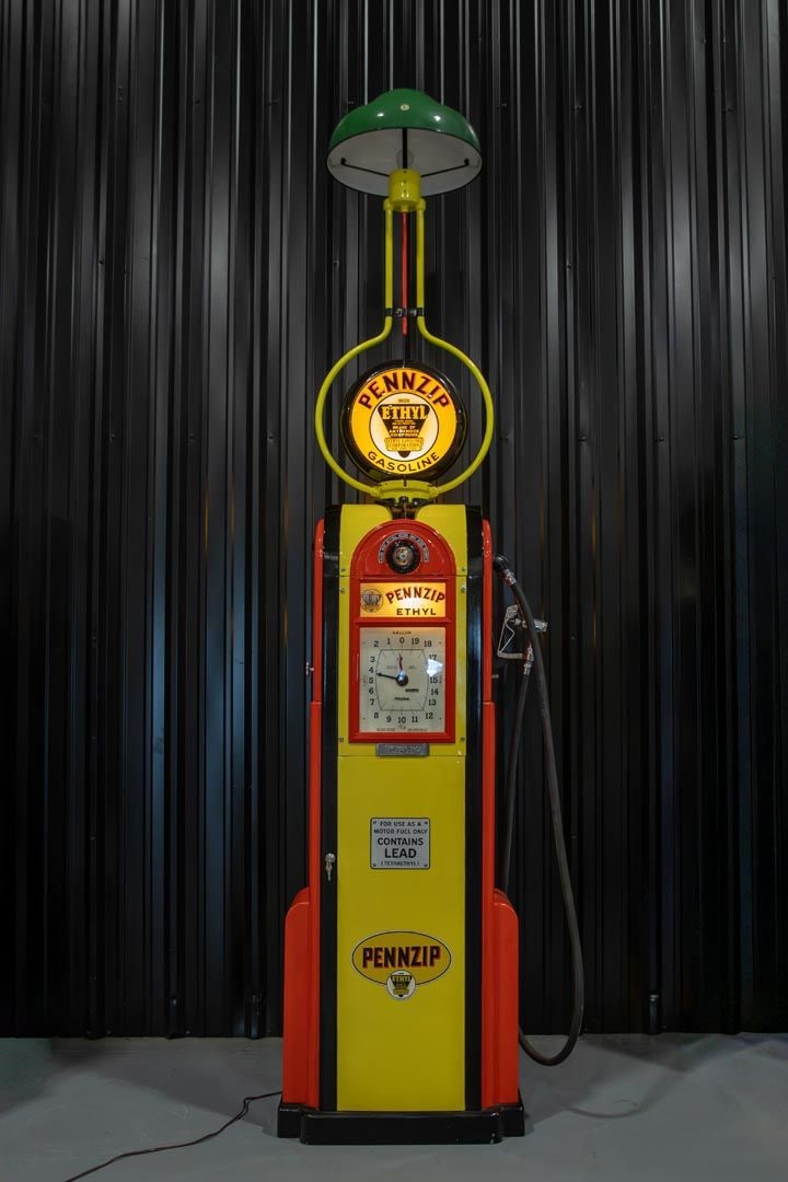 Pennzip Ethyl/Wayne 60 Clock Face Gas Pump: Beautiful presentation of dual-sided Wayne 60 Clockface, original faces, high quality paint in vibrant shade of yellow and red with black accents, original and rare Pennzip ad glass, replica decals an