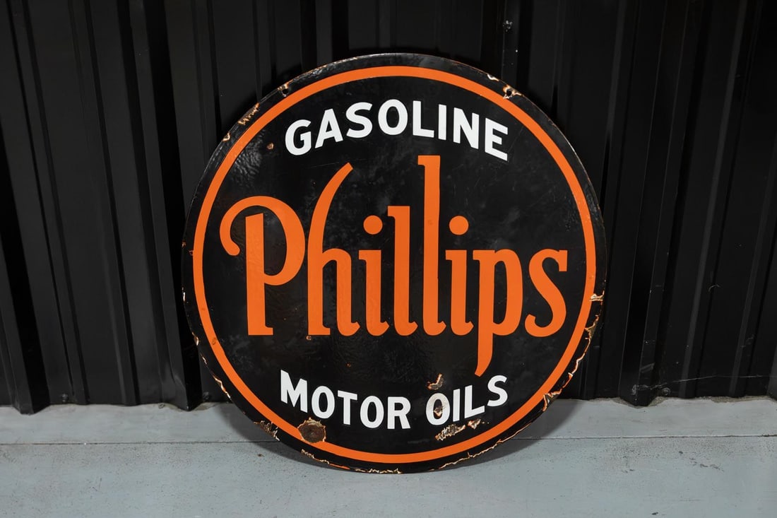 Early Phillips Gasoline and Motor Oils Double-Sided Porcelain Sign: Early round DSP, excellent color and gloss, shows wear around the lower perimeter, marked Veribright Sign-Chicago. Rated 8.5 and 8.25