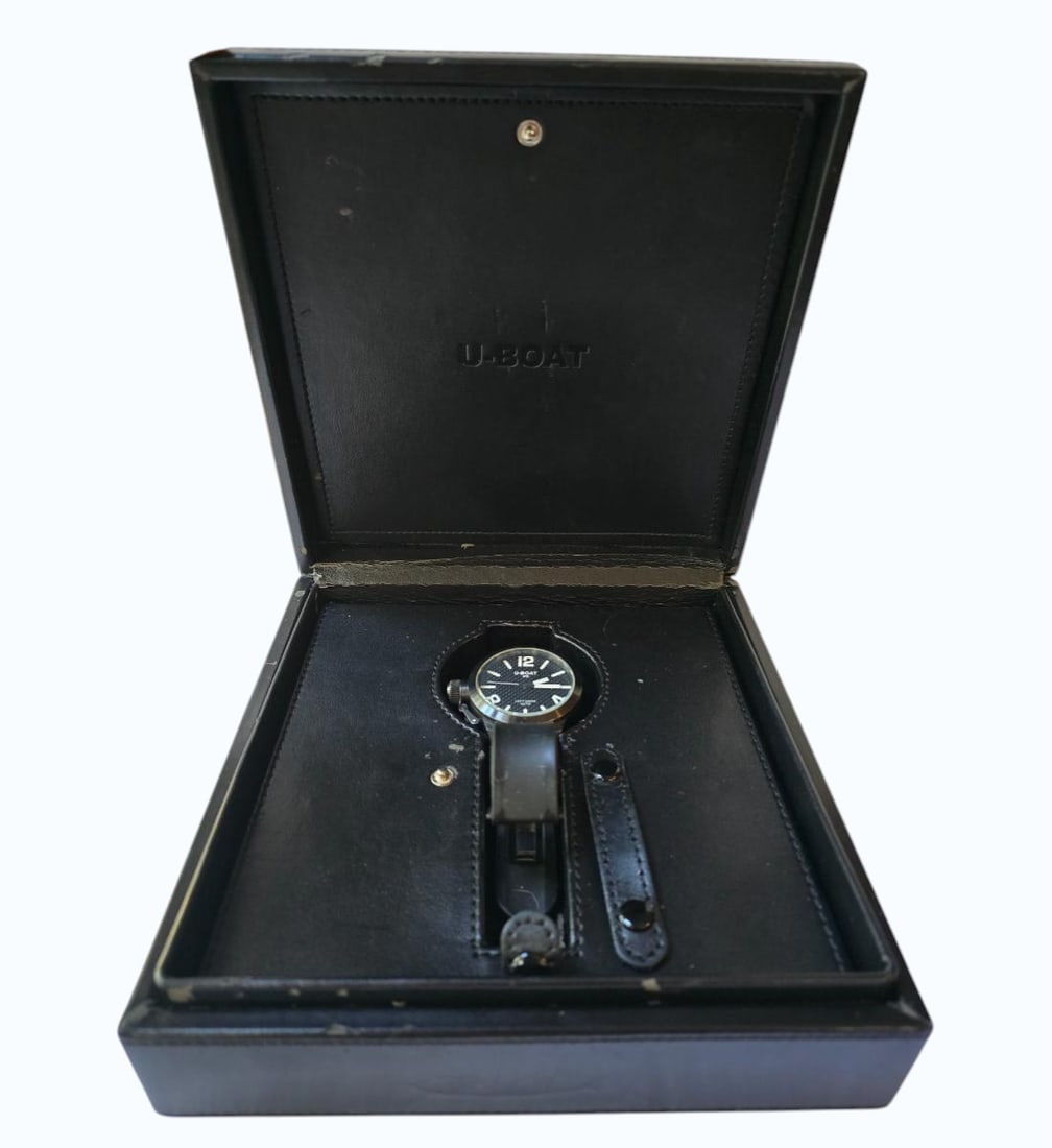 Uboat Left Hook Men's Watch With Original Box No Papers, Carries Time: *** DUE TO THIS LOT BEING JEWELRY OR GOLD IT MUST BE PAID VIA BANK WIRE TRANSFER, ZELLE OR CERTIFIED CHECK.***. Uboat Left Hook Men's Watch With Original Box No Papers. Box Measures 3" X 8 3/4" X 8 3/