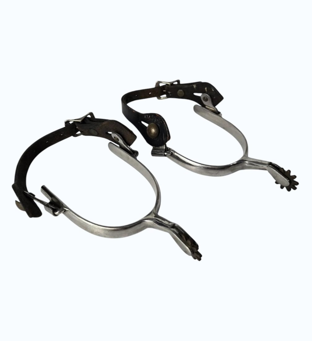 A Pair Of Antique Silver Spurs Mark Y-799: A Pair Of Antique Silver Spurs Mark Y-799. Measures 7.5" X 5" X 2". . All items must be retrieved or shipped within 15 days of auction end. Items remaining in our possession after this time will be su