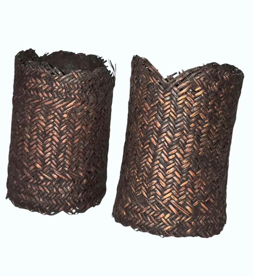 A Pair Of Antique Papua New Guinea Highlands Woven Armbands: A Pair Of Antique Papua New Guinea Highlands Woven Armbands. Measures 4 3/4" X 3 1/4". Worn by Men To Indicate Wealth, Status And Bravery. Items remaining in our possession after this time will be sub