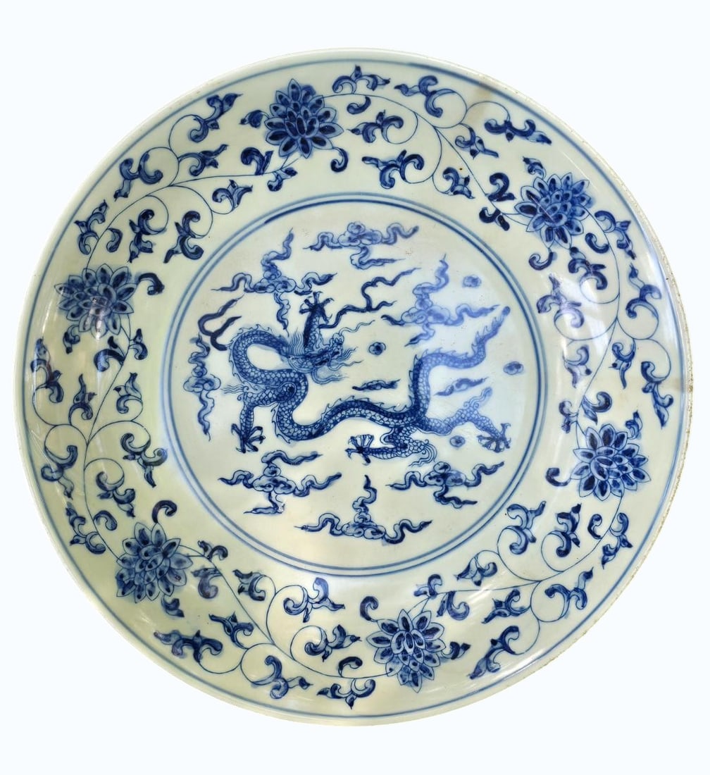 Fine Chinese Blue and White Bowl Decorated w/ a Dragon & Six Character Mark.: Fine Chinese Blue and White Bowl Decorated w/ a Dragon & Six Character Mark. Measures 2" x 8 3/4". Items remaining in our possession after this time will be subject to forfeit or storage charges.