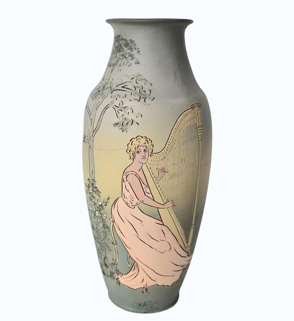 Fabulous RARE Weller Pottery Dickens Ware 16" Vase W/ Incised Woman Playing In Landscape: Fabulous RARE Weller Pottery Dickens Ware 16" Vase W/ Incised Woman Playing In Landscape Harp Signed. Measures 16" X 7" X 7". Items remaining in our possession after this time will be subject to forfe