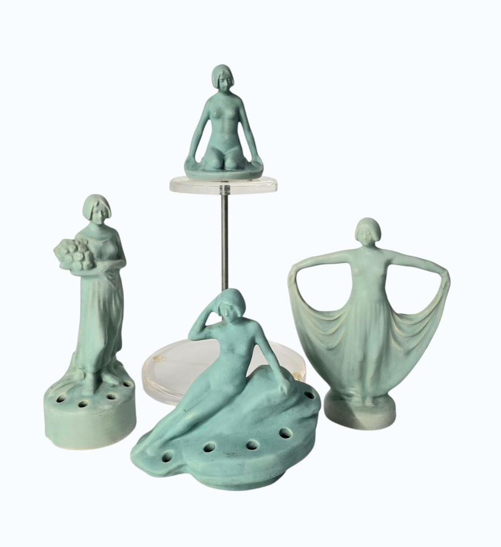 Lot Of 4 Weller Hobart Art Deco Flower Frogs Nude And Planter: Lot Of 4 Weller Hobart Art Deco Flower Frogs Nude And Planter. Measures 8" X 6 1/4" X 2 3/4", 9" X 3 1/4" X 3 1/4", 6" X 6" X 4 3/4" And 4 3/4" X 3.5" X 3 1/4". Items remaining in our possession after
