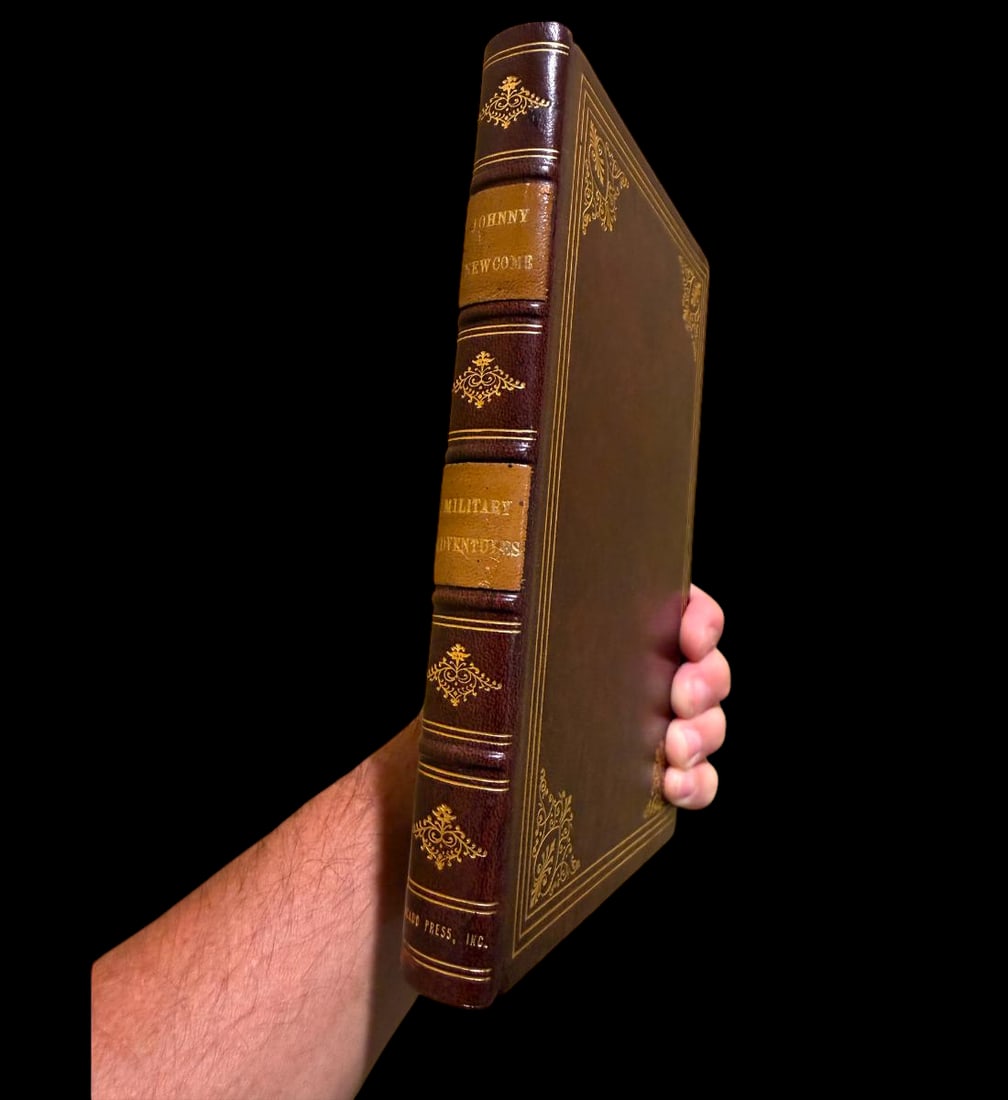 Rare first edition (1815) of The Military Adventures of Johnny Newcome by David Roberts: Rare first edition (1815) of The Military Adventures of Johnny Newcome by David Roberts, featuring 15 hand-colored aquatint plates by Thomas Rowlandson. It features a polished brown leather spine with
