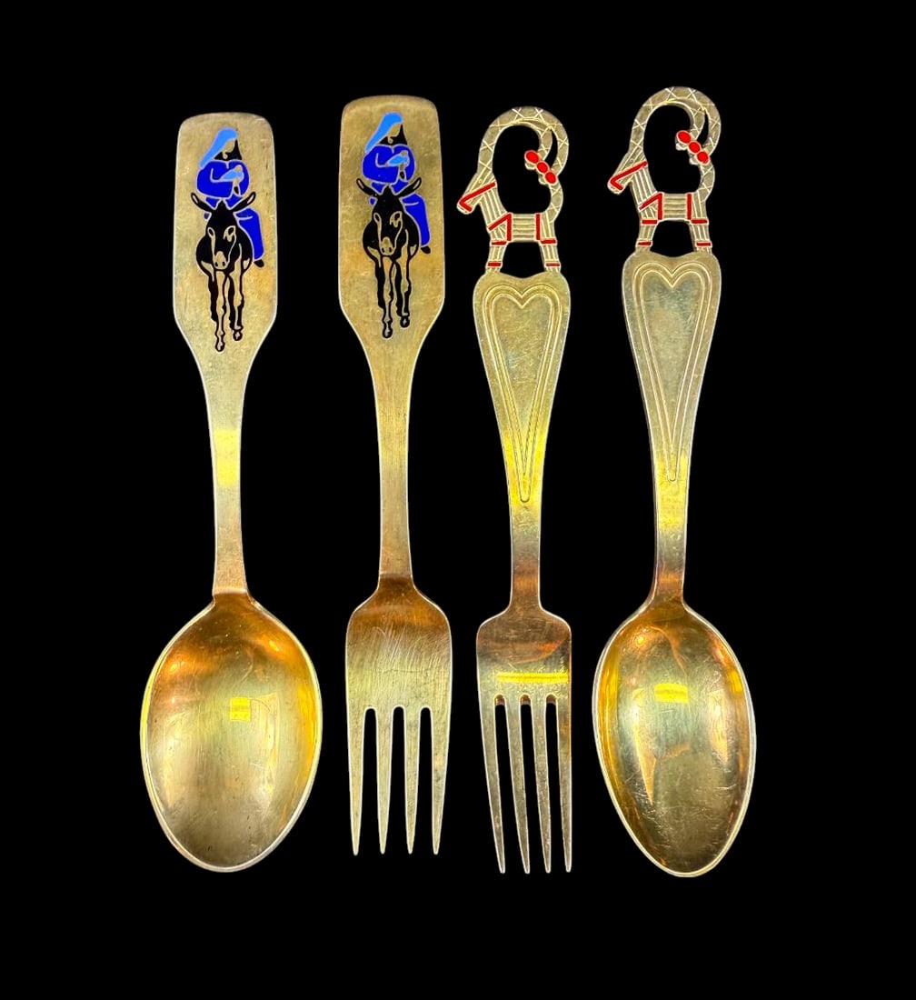 Two sets of sterling silver and gilt washed Danish forks and spoons, 174 Grams: Two sets of sterling silver and gilt washed Danish forks and spoons dated 1948 and 1966 marked A Michelsen Copenhagen. 6.25” long. Weighing 174 grams. PLEASE NOTE THIS ESTATE AND ITEMS ARE IN ST