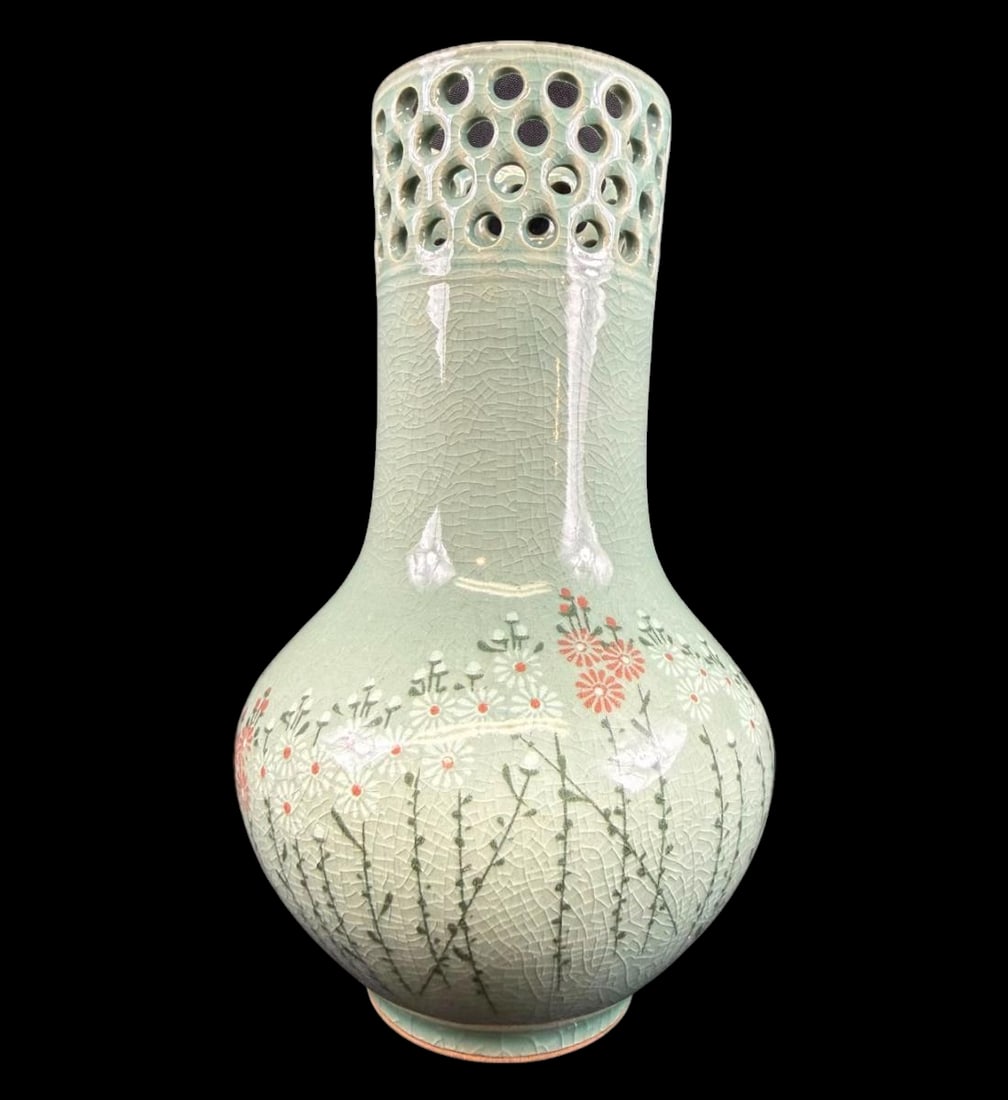 Antique Korean celadon reticulated vase with inlaid floral design: Antique Korean celadon vase with inlaid floral design and reticulated and pierced rim. Measures 9” tall. Excellent condition. PLEASE NOTE THIS ESTATE AND ITEMS ARE IN ST CHARLES MO, ITEMS WILL B