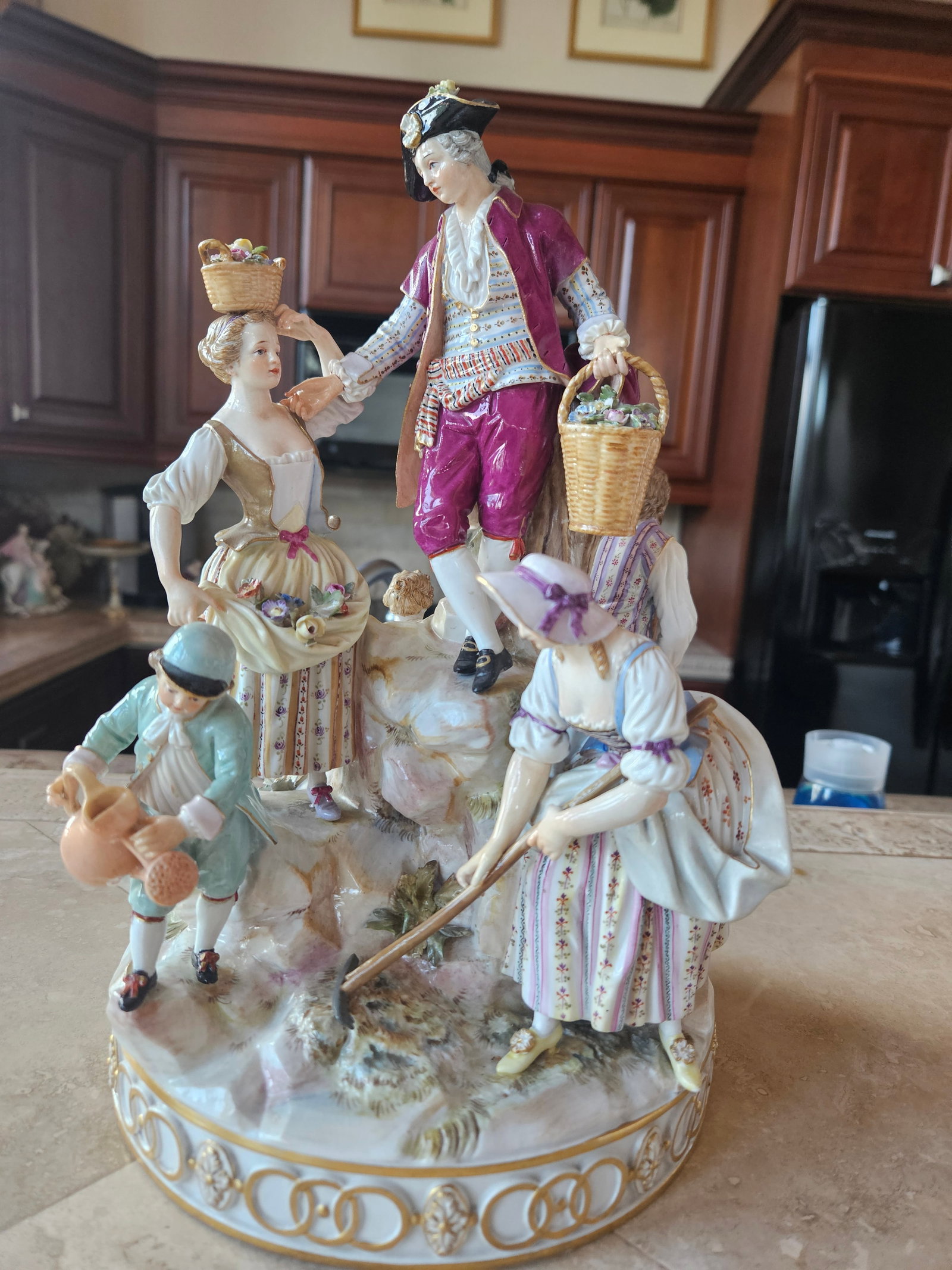 MEISSEN UNDER THE APPLE TREE: The Meissen Group D94, officially titled Under the Apple Tree (or Gardeners Groups), is a renowned porcelain figural group designed in 1772 by the French sculptor Michel Victor Acier. It is a classic