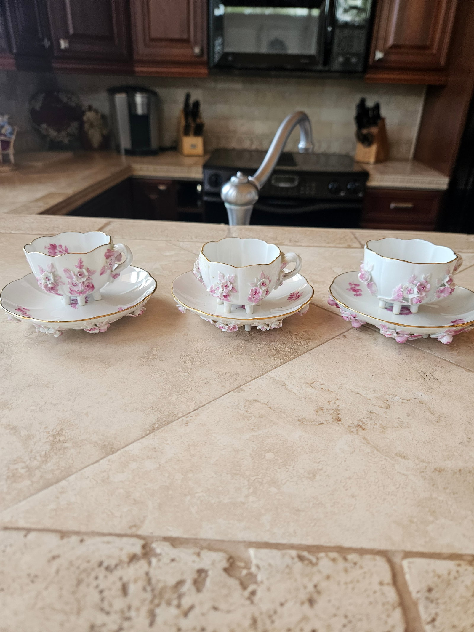 Meissen demitasse cups: Set of 3 Meissen demitasse cups with appliqué (applied) flowers are masterpieces of three-dimensional porcelain art, often referred to as floral encrusted or raised flower ware. These intricate p