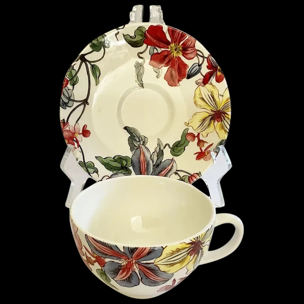 Cups and Saucers: Set of two Gein Cups and saucers, Clematites Pattern, Signed Gien and is synonymous with prestigious faience tableware since 1821. Gien pieces are renowned for their warm white clays decorated with