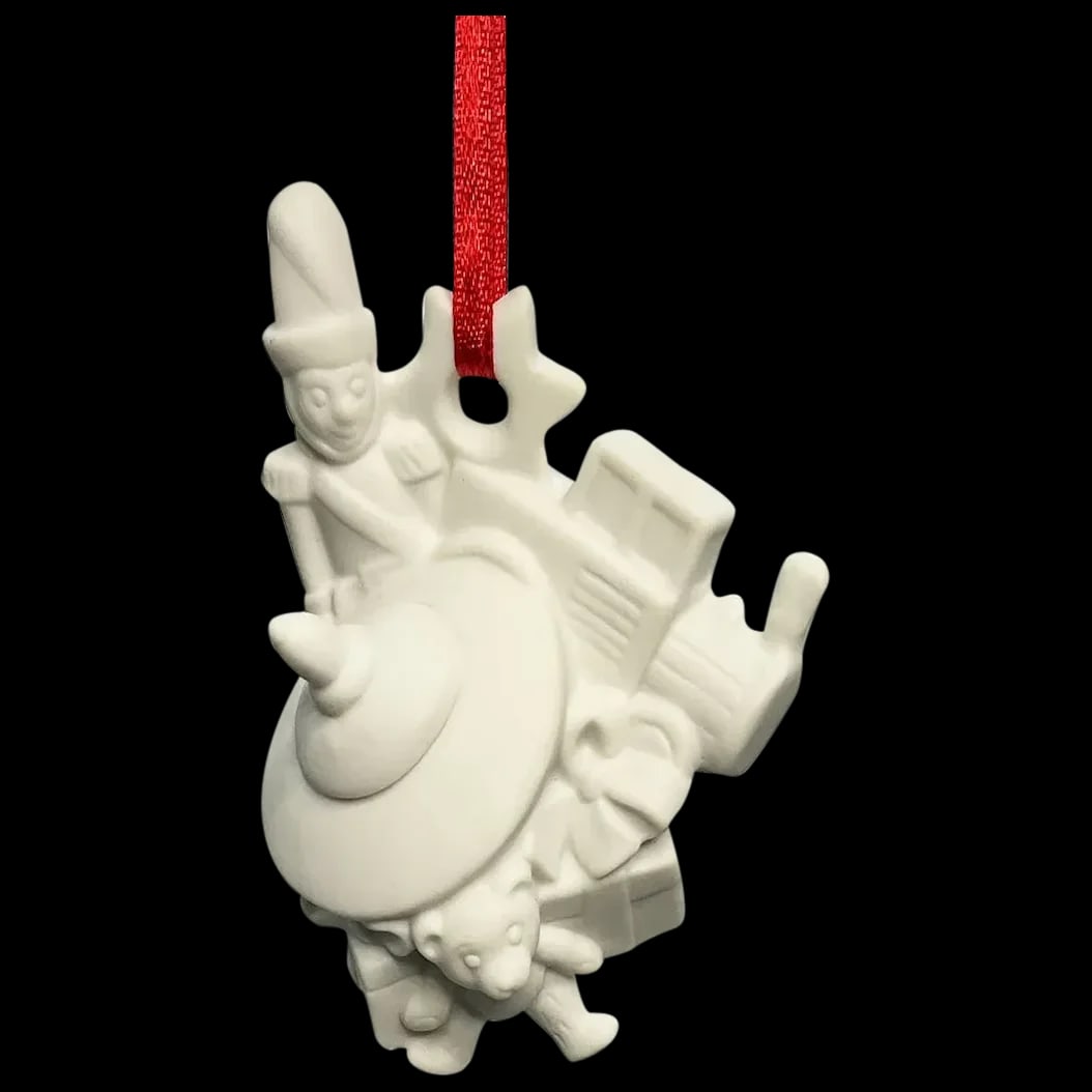 Christmas Ornament: Hutschenreuther Toy Land Christmas by W. Stefan 1990 Portraying a clown, train, teddy bear, and a spinning top in mint condition and marked with logo 1990