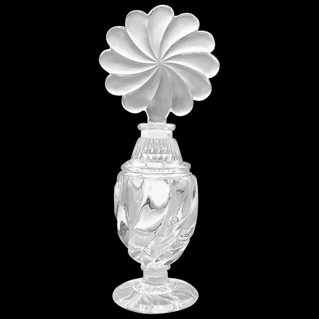 Perfume Bottle: Here we have a very large perfume bottle. It has a pretty swirl pattern throughout. The dauber by itself measures 3.75” in dia. It is handmade prior to 1990 and in excellent condition. It is