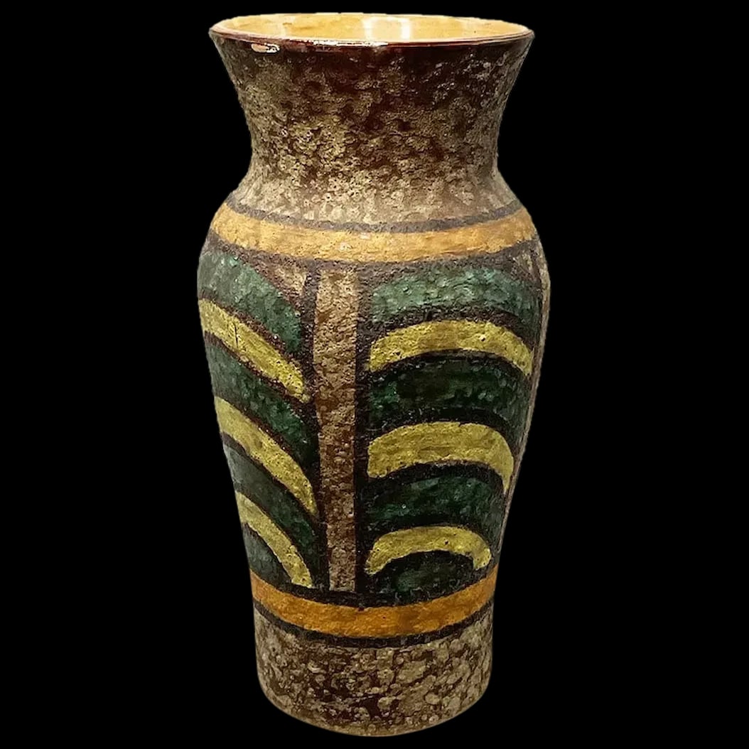 Clay Vase: Hand Crafted Clay Vase bought in Italy in 1970. It was handcrafted on a potter’s wheel The inside was glazed and the exterior is a hand painted rough surface. The bottom is stamped made in