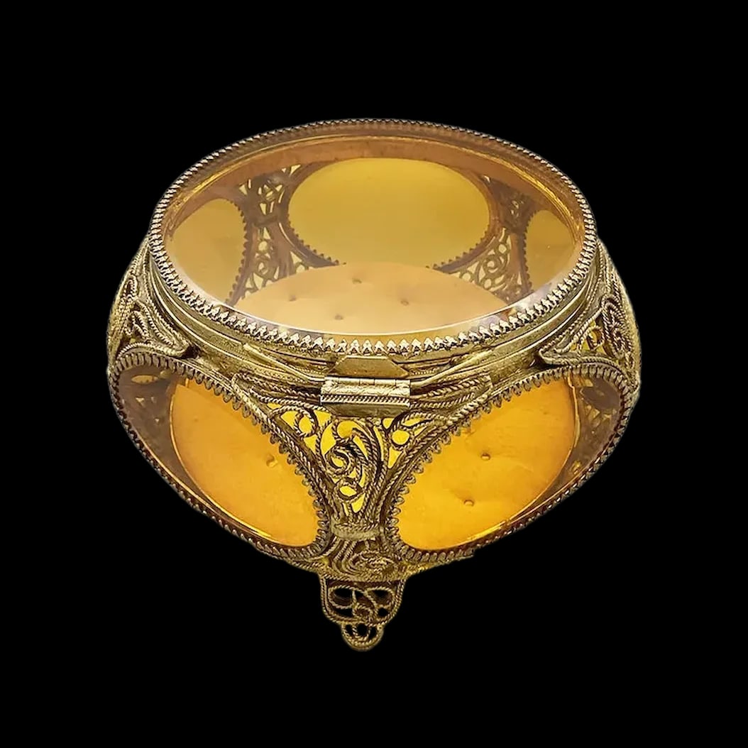 Jewelry Casket: Amber Glass and Ormolu signed from Italy and purchased in the 1960s This Ormolu Casket is footed with large oval amber glass panels. The cushion inside is worn and faded. This quality vintage jewelry
