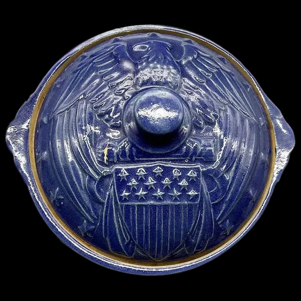 Casserole Pot: Many collectors are aware of this classic Eagle Casserole piece of McCoy Pottery Eagle Casserole in cobalt blue which was the least common color. The bottom portion has patterns of stars in the