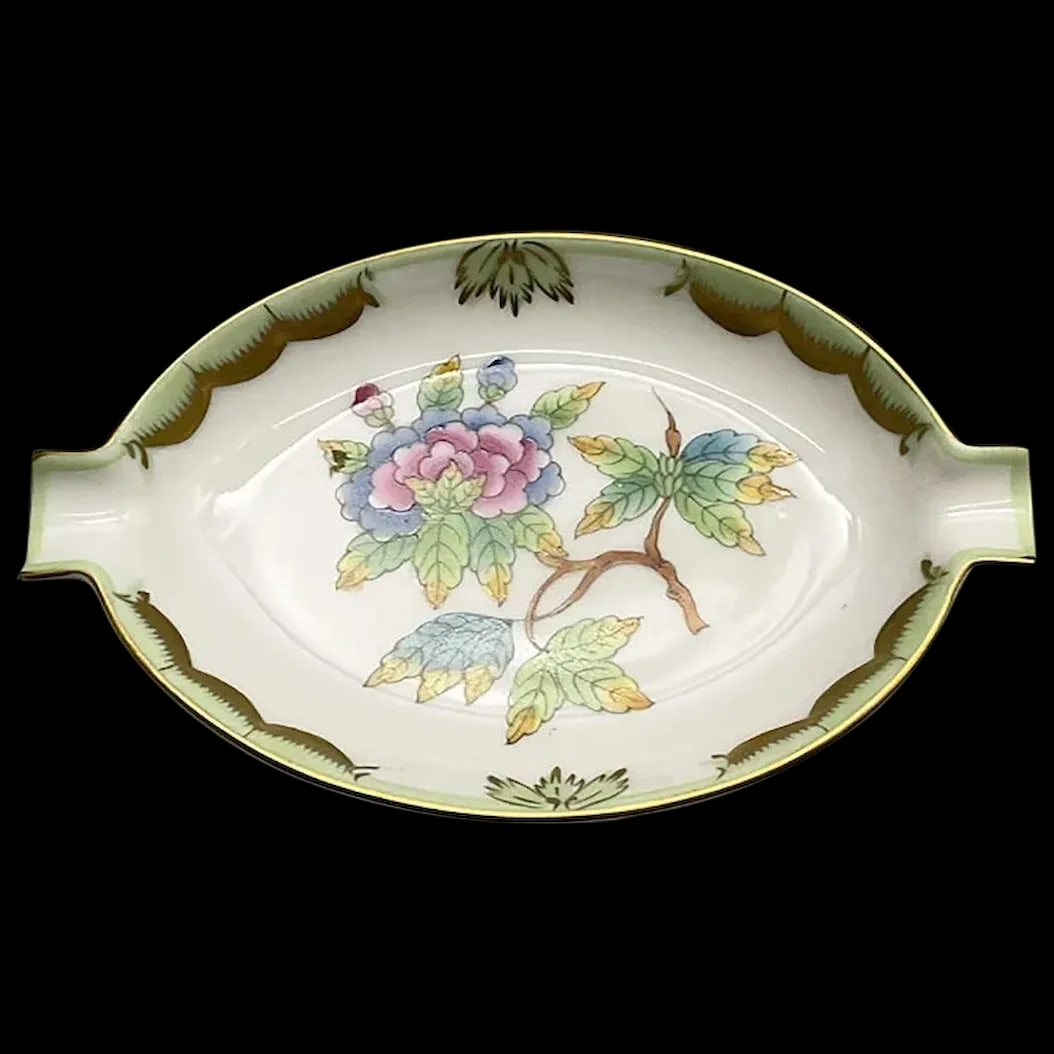 Ashtray: Herend Queen Victoria Petite Ashtray. Marked, hand painted 7784/VBO . One used as an ashtray is now used used as a spoon rest or a trinket dish. The Queen Victoria pattern is the most sought after