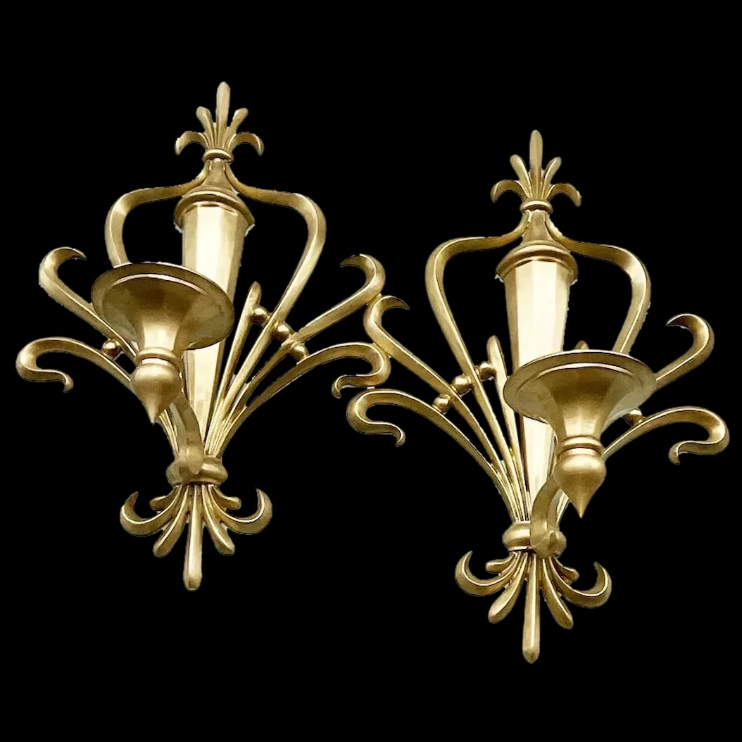 Brass Wall Sconces: Set of Solid Brass Wall Candle Sconces. Fleur-De-Lis Design. 3.3 Lbs. each. Key Hole in back for hanging. They are heavy, French Decor set of two. in mint condition.