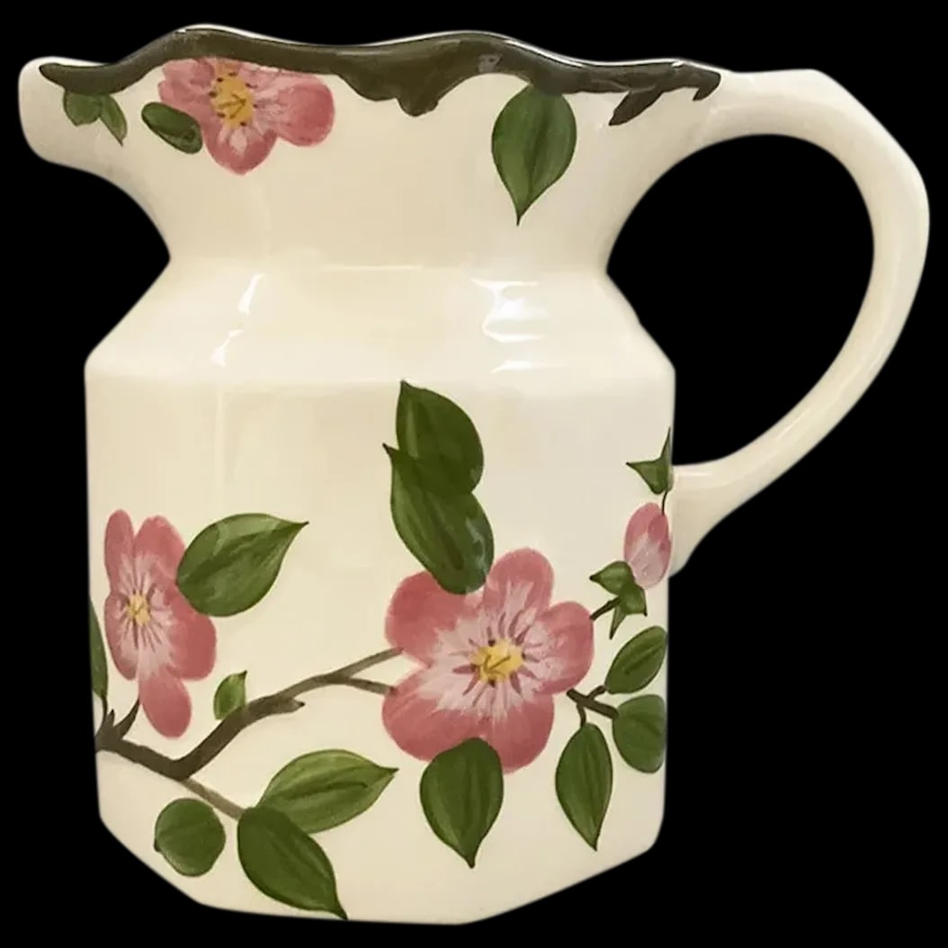 Wedgwood Jug: Franciscan Wedgwood Dessert Rose Jug. They were made between 1979 to 1983. It has the embossed dogwood flowers with brown stems and green leaves on a pretty cream color background and holds 64 ounces.