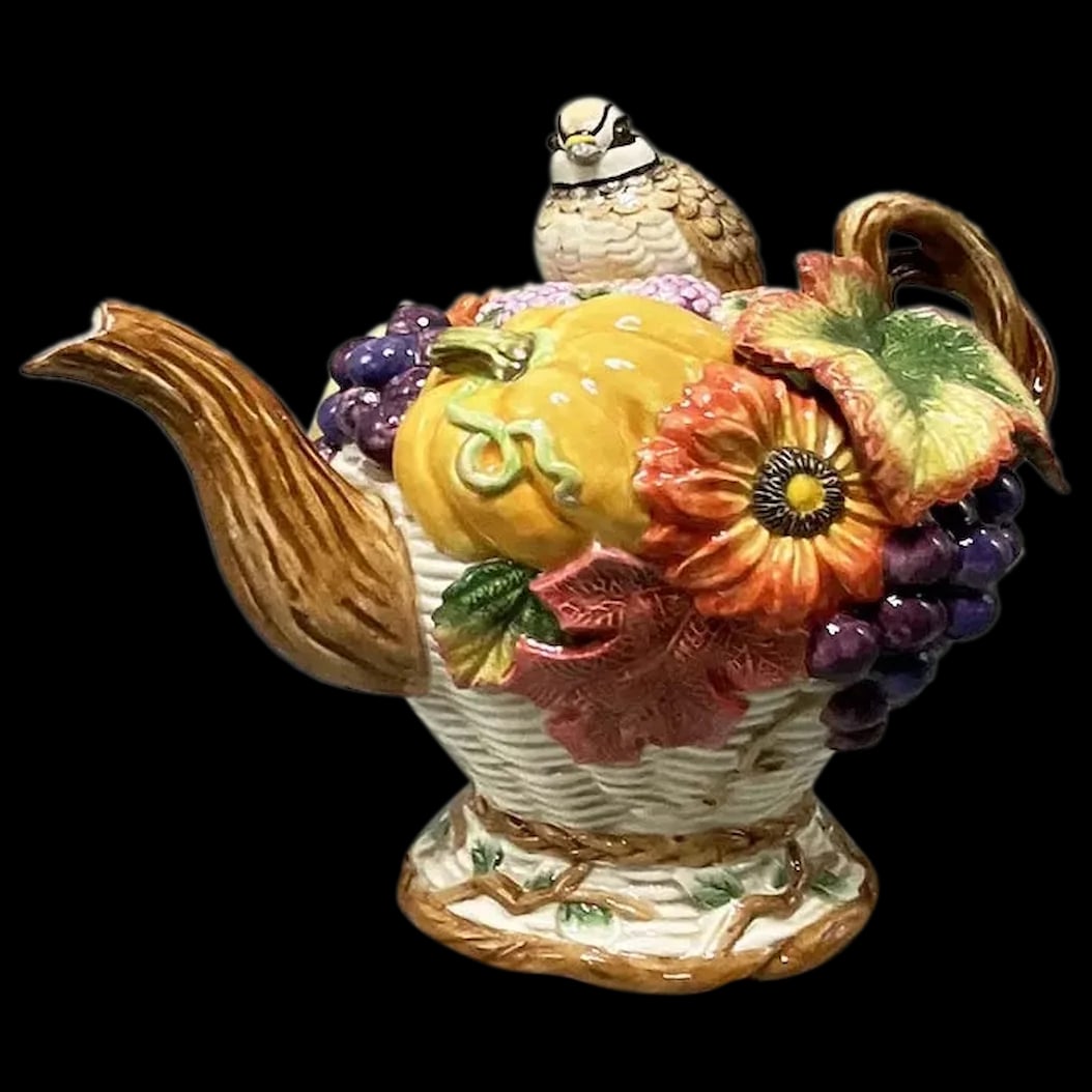 Teapot: Fitz and Floyd Autumn Bounty Teapot is so beautiful with so much stunning detail. Its a favorite because it represents everything we love about fall. The beautiful fall colors are all represented in