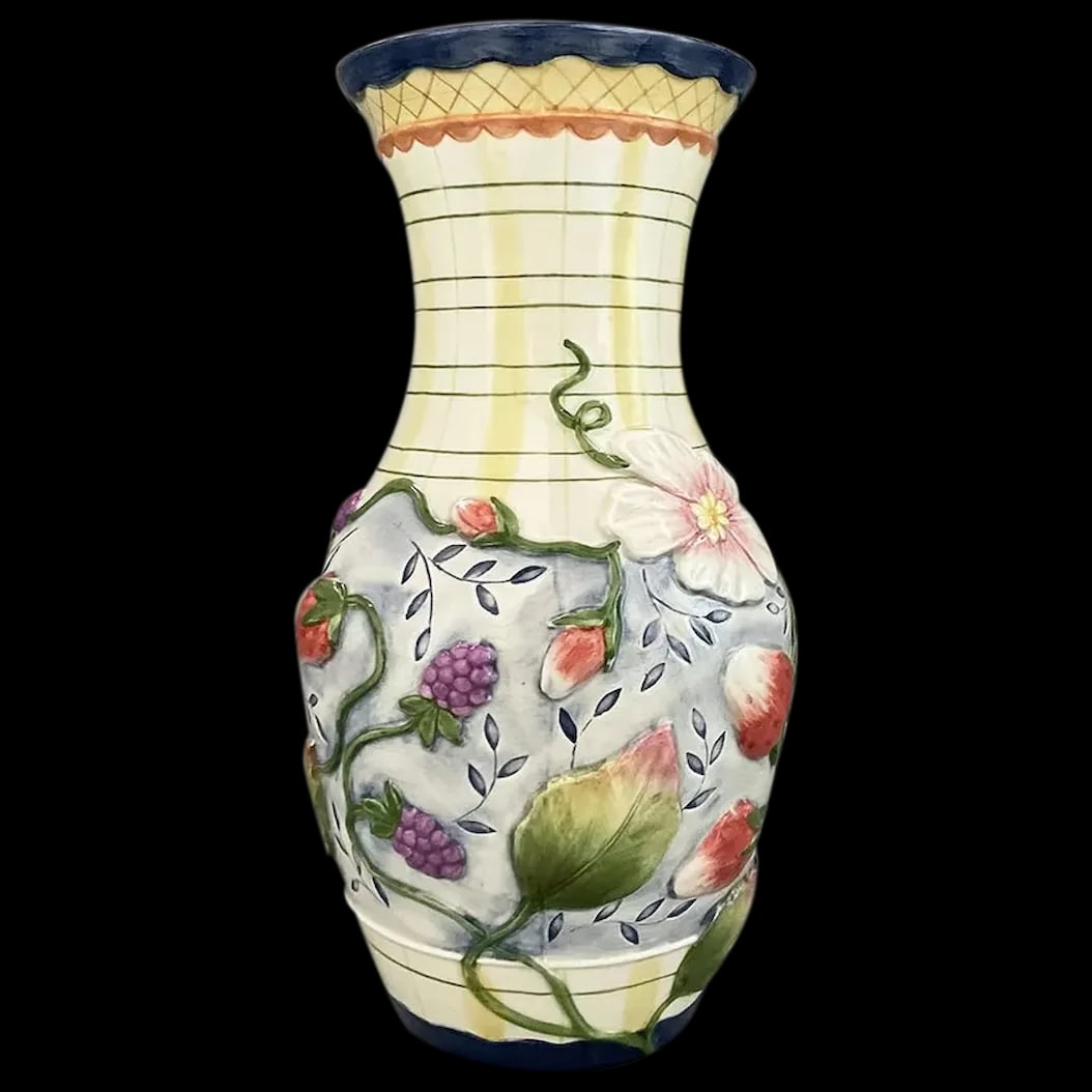 Vase: From the Fitz and Floyd Somerset collection. It is designed with a yellow, white and green plaid pattern embossed red strawberries, blueberries, yellow and green leaves, pink dogwood flowers, winding