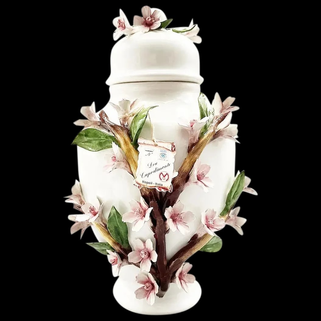 Ginger Jar: Capodimonte Porcelain Dogwood Ginger Jar is handmade in Italy. Ginger Jars are a designers dream that they like to incorporate in there designs. Beautiful embossed Pink Dogwood Flowers, Green Leaves