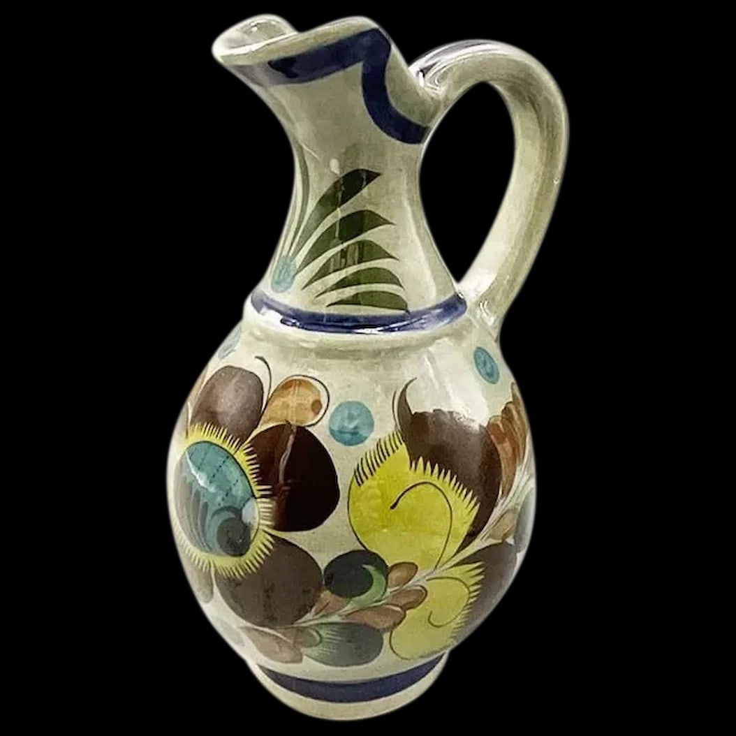 Pitcher: Here we have a Mexican Tonala Style Folk Art Pitcher in polychrome coloring. The ceramic production in Tonal is known as the authentic mestizo ceramic and is symbolic of Mexico’s identity. Made