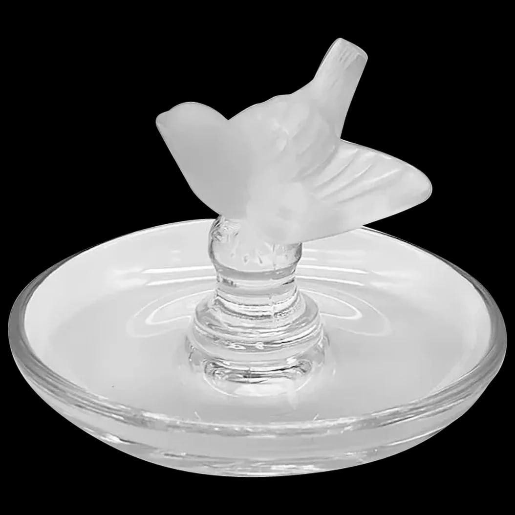 Ring Tray: Lalique Finch Ring Tray The finch is frosted and perched on a clear glass tray with its wings spread. It’s tail and head up. It is signed Lalique France. Displays beautifully in excellent condit