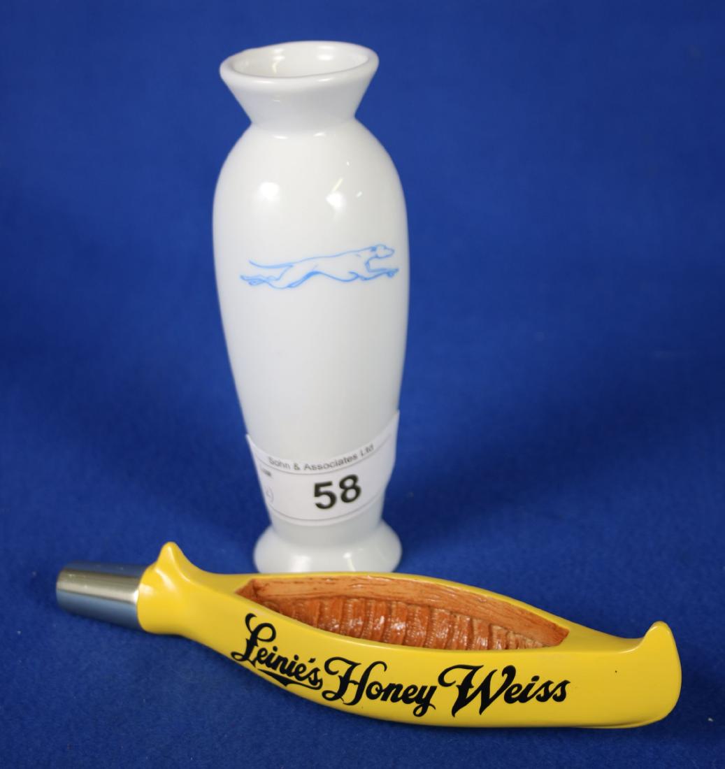 2 Advertising Pieces: 1 - China Greyhound Bus Advertising Vase, approx. 6.5"; 1 - Leinie's Honey Weiss Beer Tap Pull, approx. 8"