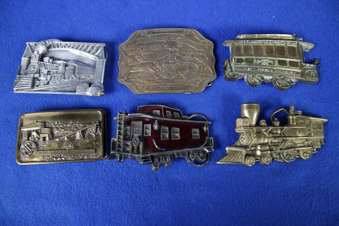 6 Belt Buckles: 5 with railroad motif; 1 - America's Heores Fire Department, Boston
