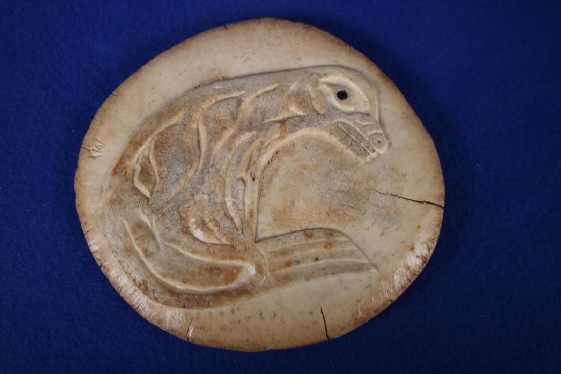 Animal Carving on Eskimo Whale Bone Disc: Artist signed, approx. 6.25"