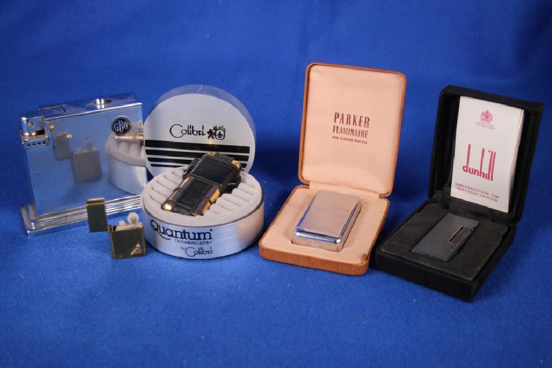 5 Lighters: One Parker Flaminaire; One Quantum Flameless Colibri; One Dunhill; One GBG Desktop One miniature brass